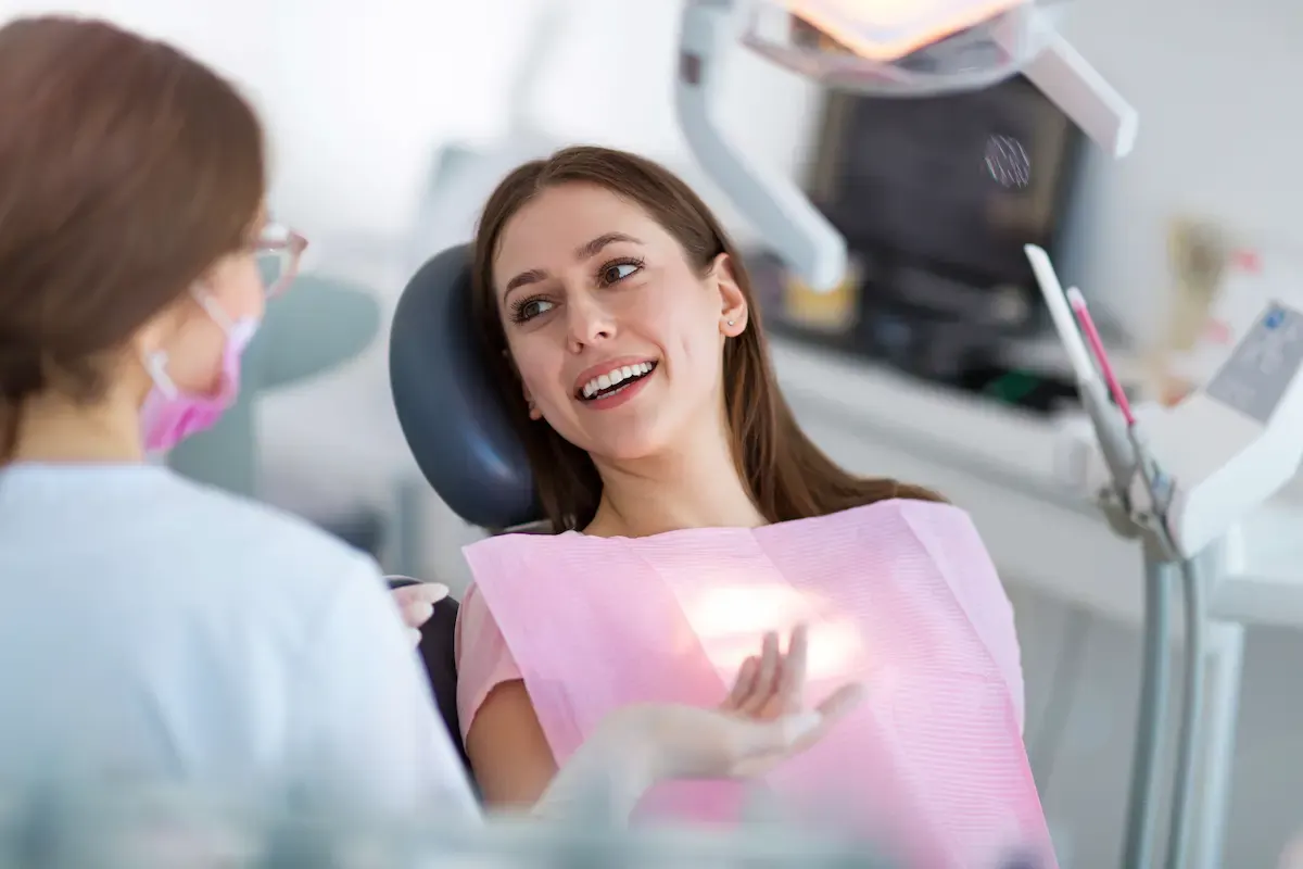 Patient chatting with a hygienist