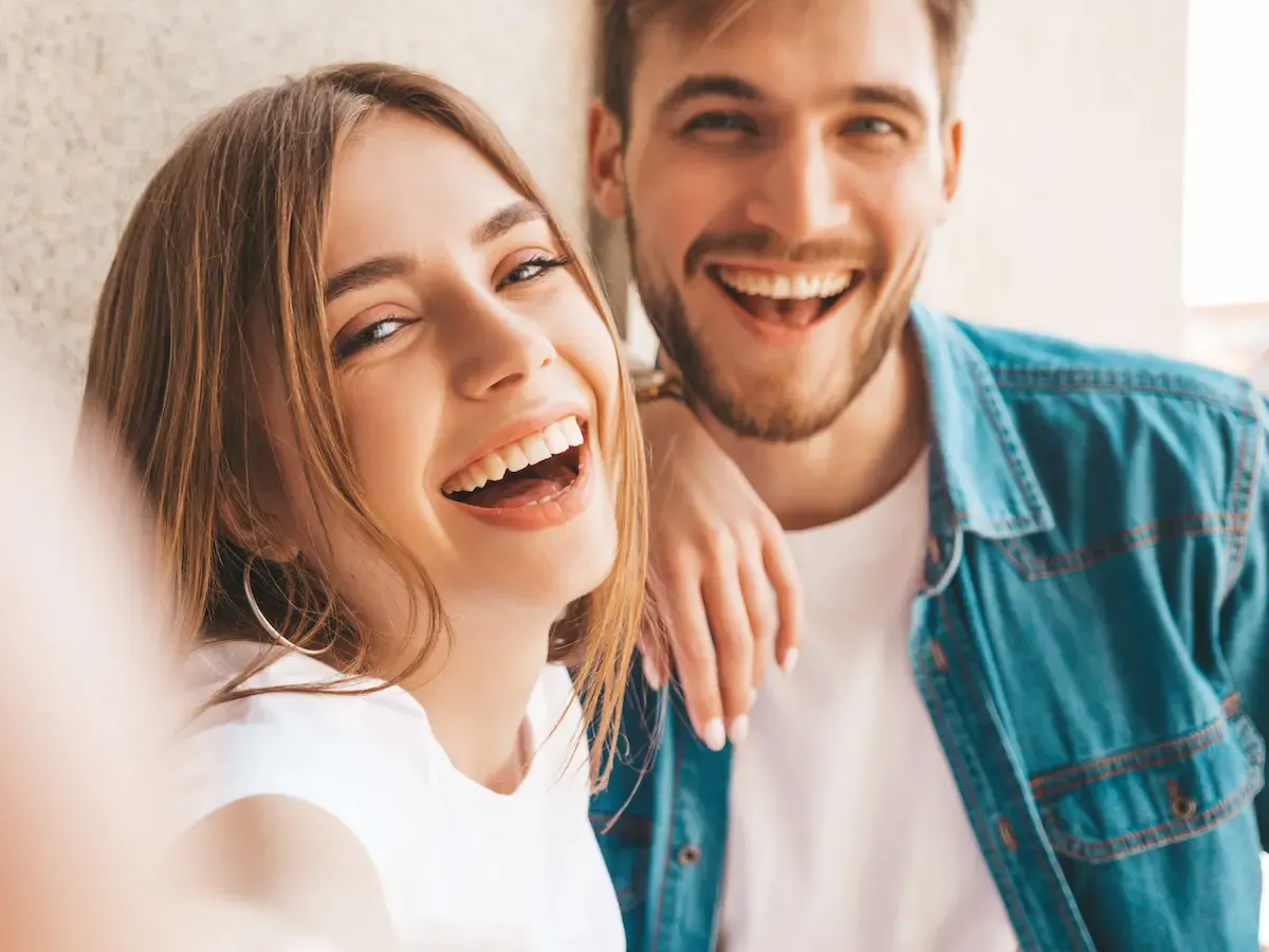 Two smiling patients